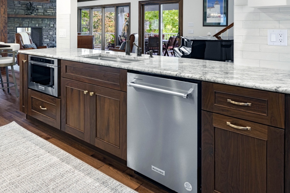 Close-up of custom cabinetry, hardware and stone countertop by Ragan Cabinets at Lake of the Ozarks.