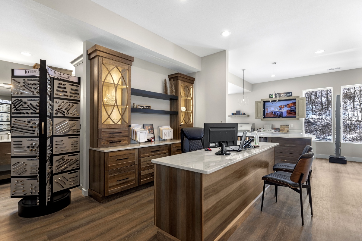 Ragan Cabinets showroom in Eldon, Missouri with cabinetry displays, hardware samples and a design consultation area.